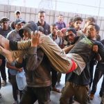 Israeli troops open fire on Palestinians en route to food distribution site, killing 32