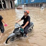 At least eight dead after heavy rain causes flooding and landslides in Southeast Asia