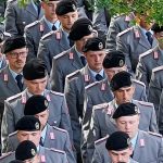 Germany inches close to agreement on contentious military service but questions remain