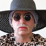 German neo-Nazi fugitive seeks to change gender back to male while on the run