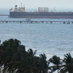 Crew paints Russian flag on Iran-linked tanker pursued by US