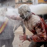 Els Enfarinats: Revelers battle with flour and eggs in traditional Spanish festival