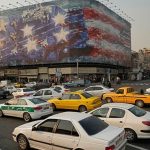 Iranian authorities unveil new billboard in Tehran warning US against taking military action