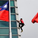 American rock climber Alex Honnold reaches top of Taipei 101 skyscraper without ropes