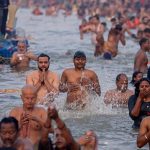 Thousands of Hindu devotees take holy dip at Sangam during Magh Mela festival