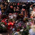 Crans-Montana: Mourners pay tribute after deadly fire at Swiss ski resort