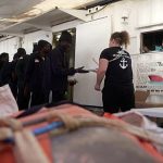 Survivors rescued by SOS Méditerranée mark New Year with hot meal