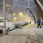 Visitors take in snowy NYC ahead of traffic closure