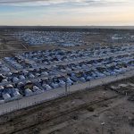 Syria starts evacuating Al-Hol camp housing thousands linked to IS, officials say