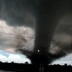 Powerful tornado tears across Oklahoma, damaging homes and blocking roads