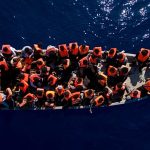 More than 70 people feared dead after migrant boat capsizes in the central Mediterranean