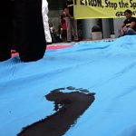 Greenpeace stages beach protest against fossil fuels during Colombia conference