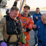 Moment Artemis II capsule splashes down in Pacific