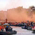 Thousands filled Amsterdam’s streets and canals to celebrate the king’s birthday