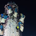 Climbers race up giant bun tower at Hong Kong’s colourful Bun Festival