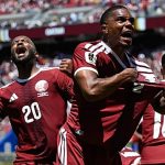 Qatar claims first-ever World Cup point with dramatic stoppage-time equaliser
