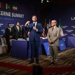 US and Iran publicly trade threats as talks take place in Switzerland