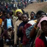 Thousands of migrants queue for repatriation in South African camps