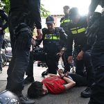 Morocco’s World Cup win sparks celebrations and clashes in the Hague