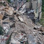 China rescuers race to find trapped people after landslide
