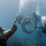 Divers restore Italy’s Christ of the Abyss monument