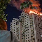 Russian missile and drone strikes kill 13 in Kyiv after Zelensky warns of massive attack
