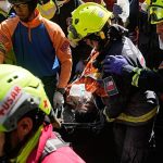 Venezuelan security guard pulled alive from basement eight days after twin quakes