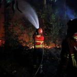 Over 2,000 emergency personnel tackle wildfires still raging in Portugal