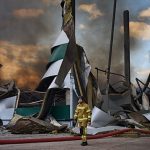 Russian drone strikes hit Ukraine as warehouses burn