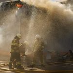 Hundreds evacuated after Russian strike sparks major fire and explosions at a warehouse in Bucha