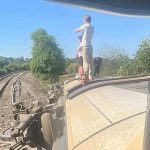 Two injured after train derails in southeast England, emergency services say