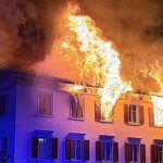 Swiss apartment block fire leaves five missing and eight injured, police say