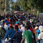 Spanish authorities begin relocating migrants from Ceuta beach to temporary shelters