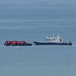 Record 230 migrants cross English Channel in single small boat, French officials say