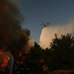 Aerial firefighters take off to tackle major wildfire in Greece after two killed in helicopter collision