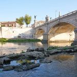 Drought exposes remains of ancient Roman bridge in the Tiber river in Rome