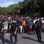 Spain moves hundreds of migrants from Ceuta beach to temporary shelters