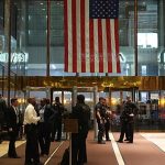 Macron walks through busy New York streets to Trump Tower