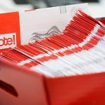 Trump presses Supreme Court to curb mail voting as ballots begin reaching Americans