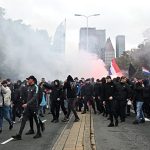 Dutch police clash with hundreds of far-right protesters at anti-immigration rally