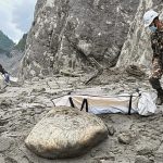 Mass burials of unidentified victims continue in Nepal as death toll exceeds 1,000 one week after flash floods