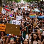 Tens of thousands of people take to streets of Paris to march for Pride
