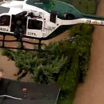 Spain: Guardia Civil rescues family and dogs from rising floodwaters in Oliva