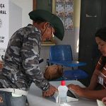 Brazil: long queues and river journeys mark decisive presidential vote