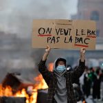 French students clash with police as school protests spread nationwide