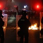 Kosovo police use tear gas on protesters demanding curbs on war crimes court